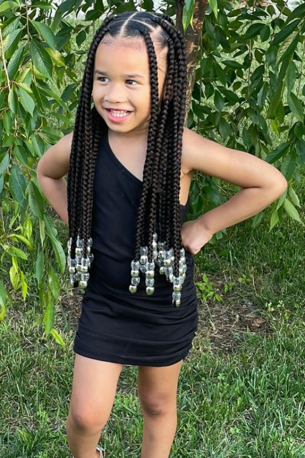 Braids and beads are a perfect pair for kids, creating a fun and stylish look
