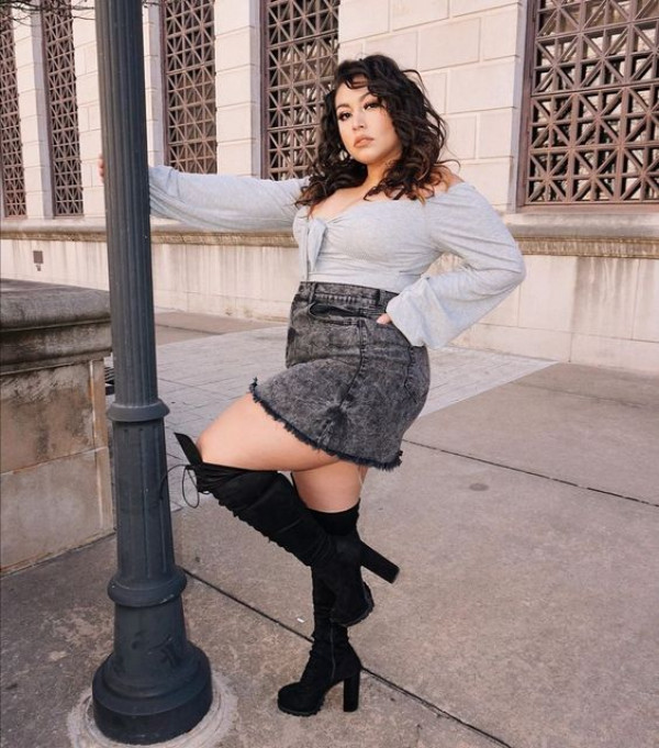 I mean, can we talk about this thick white girl's look with thigh-high boots and a denim skirt? It's everything!