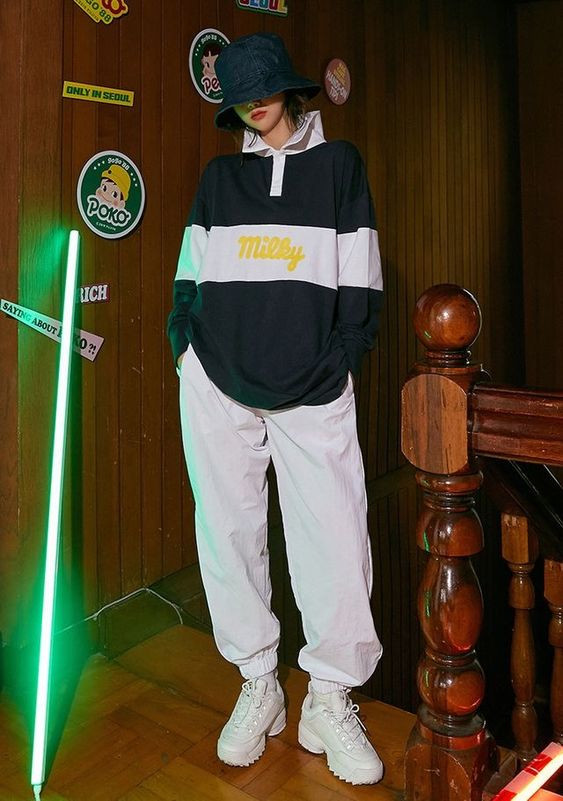 You can't go wrong with her tomboy attire in a mint-accented tracksuit!