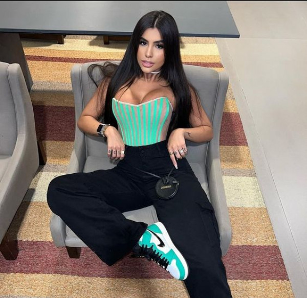 Going for a casual corset look, Latina Baddies adds some mint and black flair, topped off with turquoise kicks!