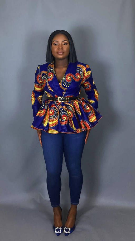 Fashion model in ankara dress peplum top african wax prints and blue dress.
