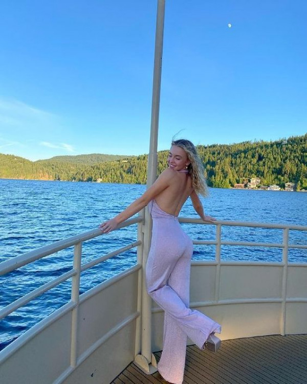 Her hot jumpsuit is totally lake-ready chic, making her a waterside wonder