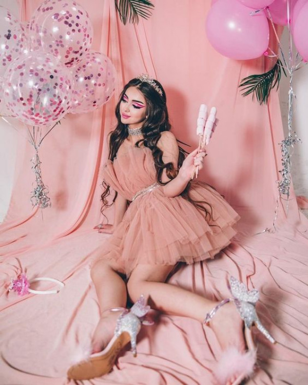 Wish for a great time while wearing this pink party dress that's perfect for birthday fun