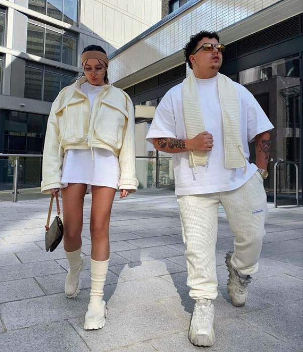 They're rocking textured whites for a chic urban stroll with their matching outfit