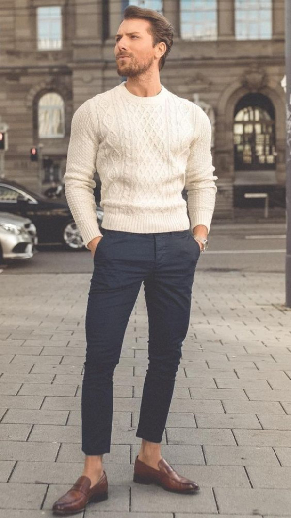 For a polished juror look, pair up cable knit wool with navy trousers