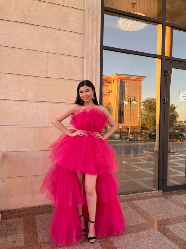 Be a birthday queen in a hot pink tulle masterpiece that's truly extravagant