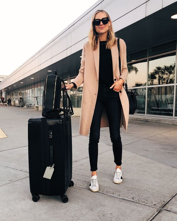 Beige Wool Coat, Airport Outfits Ideas With Black Jeans | Leather jacket, luggage and bags