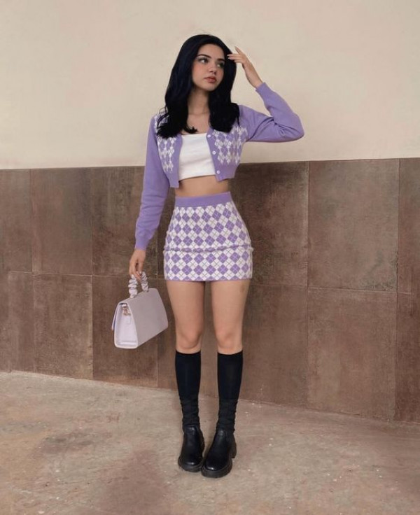 During the day, she's living her purple dream with a skirt and a cropped jacket, making it a stylish symphony
