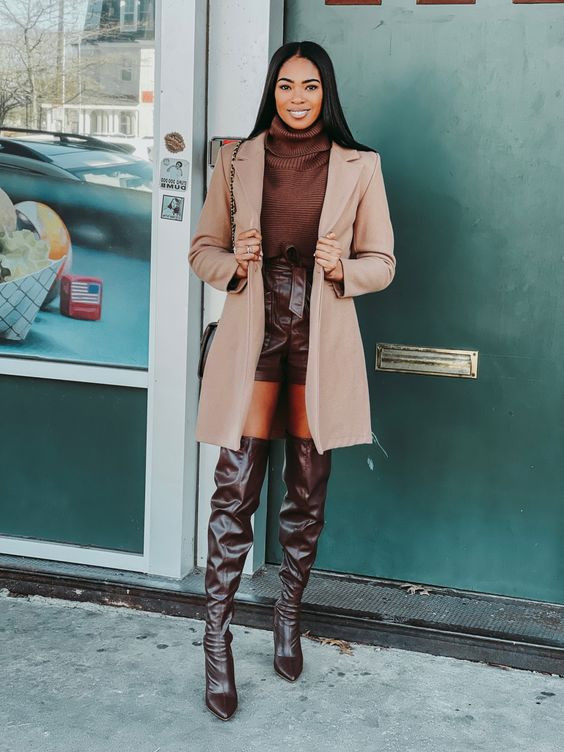 Let your confidence shine in this perfectly paired Brown turtleneck with knee-high boots!!