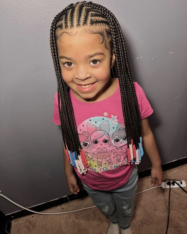 Let your child's bright energy shine with kids' box braids blossoming in pink