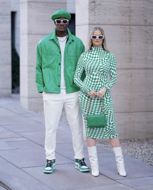 Featuring bold patterns and sharp cuts, their couple's matching outfit is sure to make others green with envy