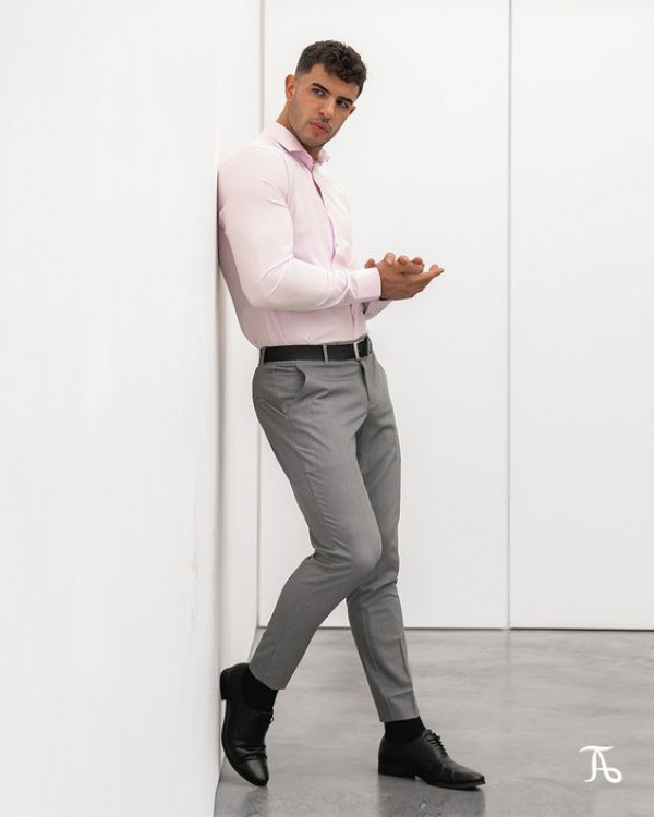 Make a statement with a pink cotton shirt paired up with refined grey for legal proceedings!